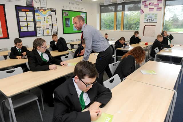 Year 7 pupils experience their first lesson after nearly six months out of the classroom.

Picture: Sarah Standing