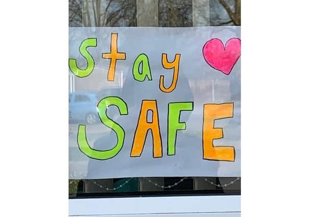 Finlie, Ebonie and Tobbie Hynd from Fareham have been creating colourful pictures to give to their neighbours and brighten their days
