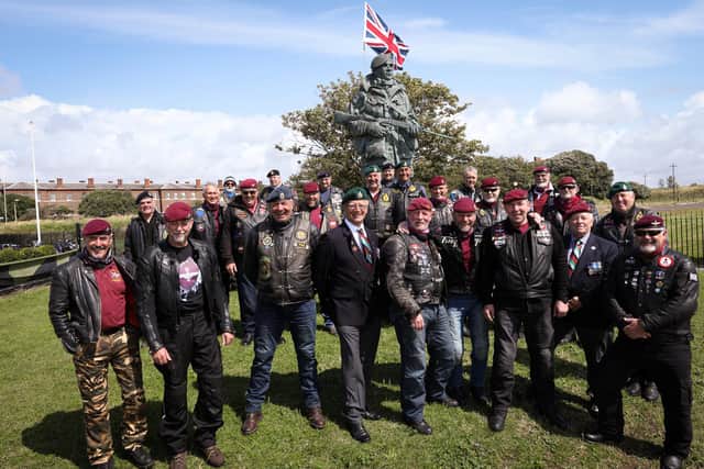 Motorcyclists Paul Moore, Phil Danant and Tony McKie are travelling around the country to visit graves and memorials in a 'Ride of Respect' for The South Atlantic Medal Association, which supports Falklands War veterans. They are pictured at the Yomper memorial in Eastney with supporters. Picture: Chris Moorhouse (jpns 090821-)