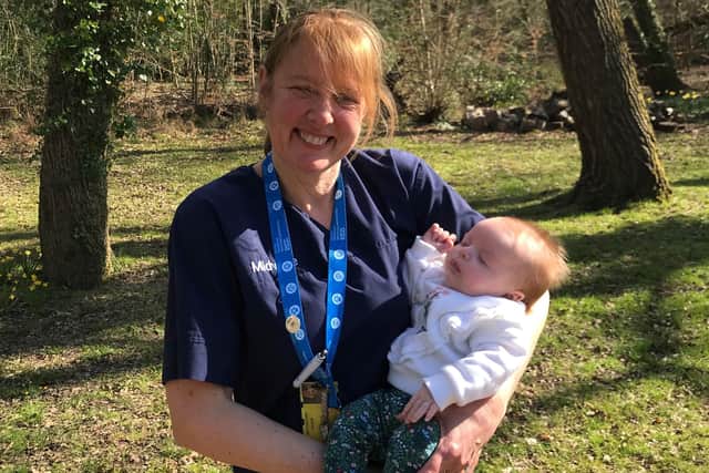 Midwife Sarah Backhouse Fitton is running the London Marathon for Portsmouth Hospitals Charity. Pictured: Sarah, who has  had a 35-year career in the NHS