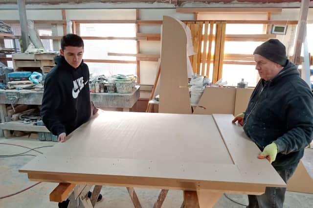 Student in our wood workshop with our master pattern maker.