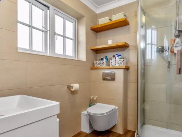 This property comes with four bedrooms, two bathrooms and two reception rooms as well as a huge garden and parking.