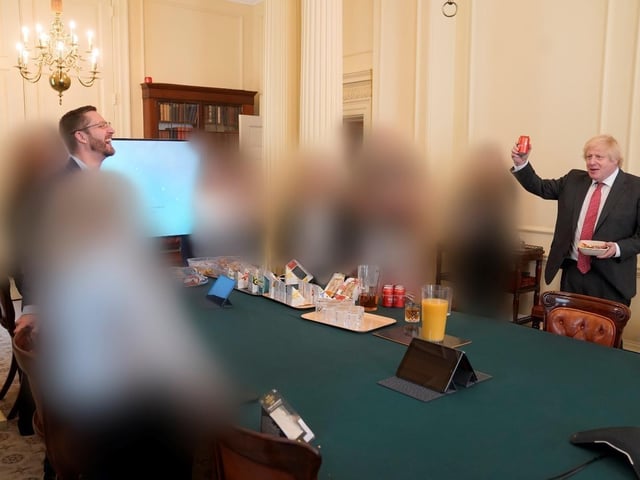 Picture shows Boris Johnson (right) at a gathering in the Cabinet Room in 10 Downing Street on his birthday, which has been released with the publication of Sue's Gray report into Downing Street parties in Whitehall during the coronavirus lockdown. Issue date: Wednesday May 25, 2022.