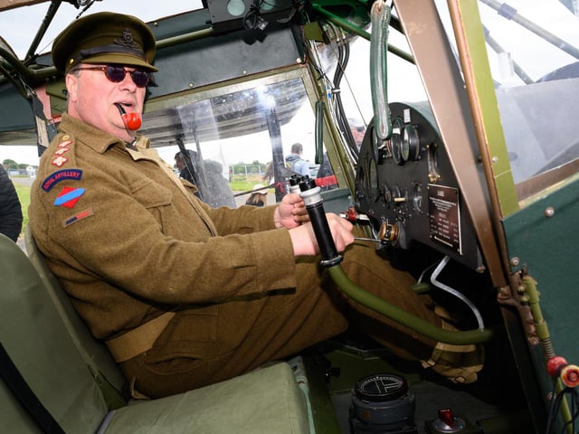Pictured is: Mike Roberts in his 1943 Auster Mk4, one of only two in existing. They are raising money for the Project 71 veterans groupPicture: Keith Woodland (080621-58)