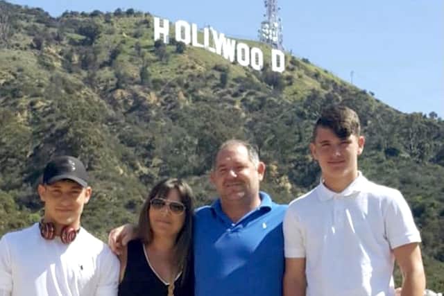 The Bridgman family pictured together in America, with Alfie (far right) and dad Glenn (centre)