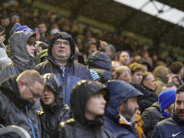 Pompey fans braved terrible weather conditions on New Year's Day to cheer the Blues to victory against Swansea.