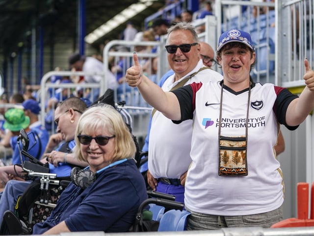 These Pompey fans have given the changes at Fratton Park the thumbs up.    Picture: Jason Brown/ProSportsImages