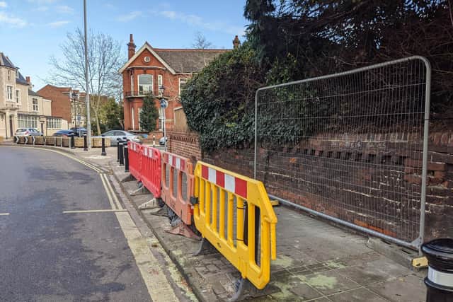 The damage to the wall outside Rainbow Corner. Bollards put up to stop crashes have been knocked over on several occasions. Picture: Emily Turner.