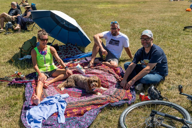 Enjoying the show at the Bandstand. Pictured: Susan Pengilley (50), Justin Pengilley (48) and Craig with dog Farley. Picture: Mike Cooter (240623)