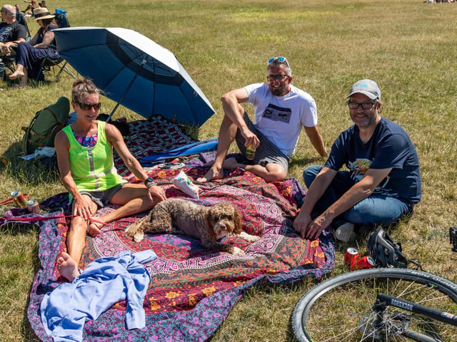 Enjoying the show at the Bandstand. Pictured: Susan Pengilley (50), Justin Pengilley (48) and Craig with dog Farley. Picture: Mike Cooter (240623)