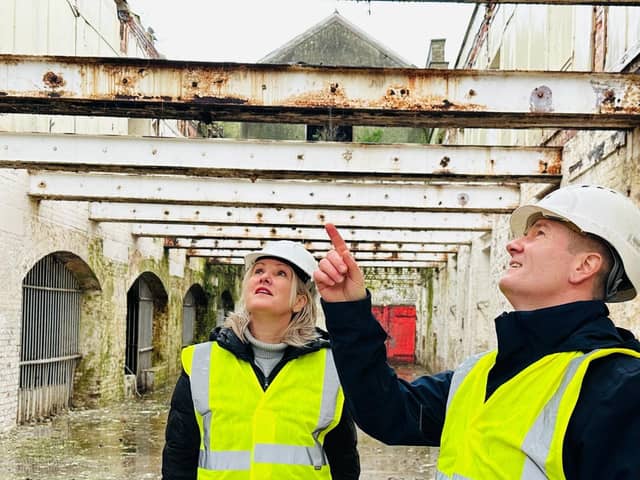 Gosport MP, Dame Caroline Dineage with UK Docks' Ben Mason at the derelict former Rum Store.