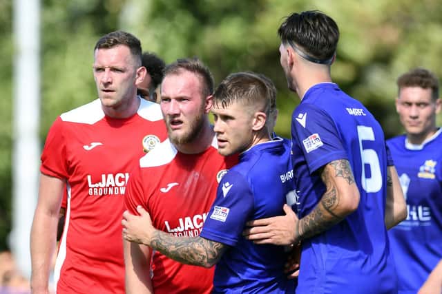 Baffins Milton Rovers (blue shirts) v Horndean
Picture: Neil Marshall