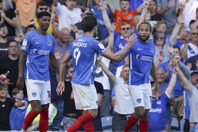 Marcus Harness is congratulated by John Marquis after scoring the second goal of Saturday's win over Crewe. Picture: Jason Brown