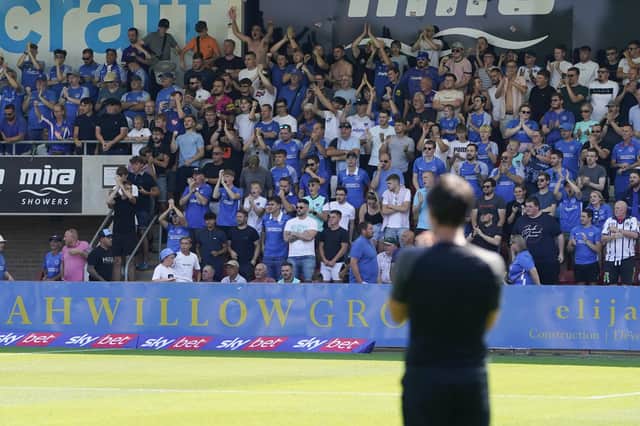 Danny Cowley applauds the travelling Fratton faithful who cheered the Blues on despite the soaring heat at Cheltenham on August 13.