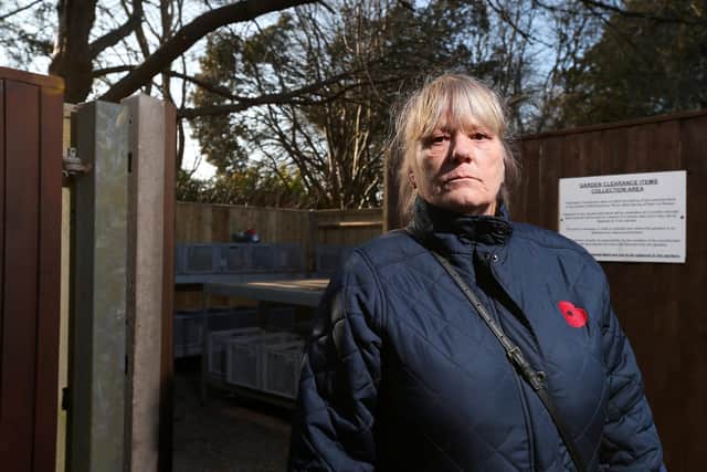 Karen James objects to the way in which memorials are cleared away so quickly by staff at Portchester Crematorium. Mrs James is pictured in front of the crematorium's 'gardens clearance items collections area'
Picture: Chris Moorhouse