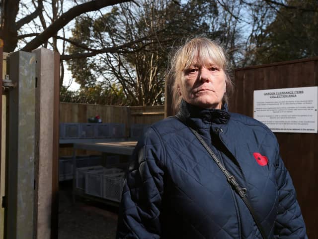 Karen James objects to the way in which memorials are cleared away so quickly by staff at Portchester Crematorium. Mrs James is pictured in front of the crematorium's 'gardens clearance items collections area'
Picture: Chris Moorhouse