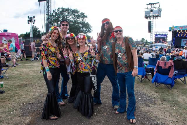 Festival goers getting into the spirit of the 'Peace, Love and Understanding' theme at the Isle of Wight Festival 2021. Picture by Emma Terracciano