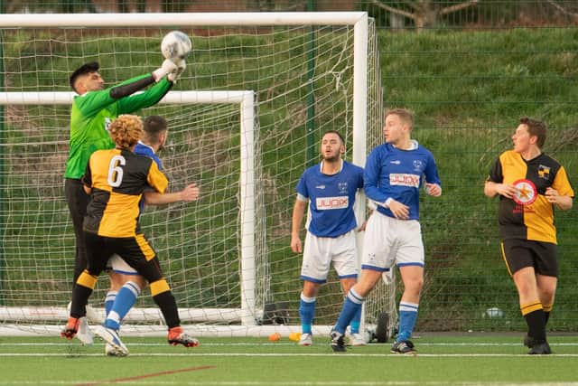 Denmead keeper Prad Bains saved three penalties in the Portsmouth Senior Cup slaying of AFC Portchester. Picture: Keith Woodland