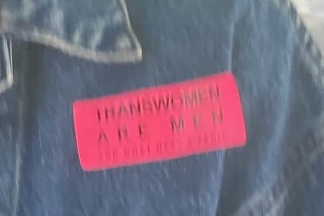 Chinzia Ogilvie wearing her jacket with a badge on saying ‘transwomen are men’ after appearing at Portsmouth Magistrates' Court. Pic Steve Deeks