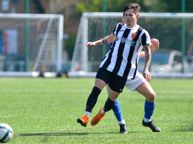 Denmead (blue) v Hayling. Picture by Martyn White