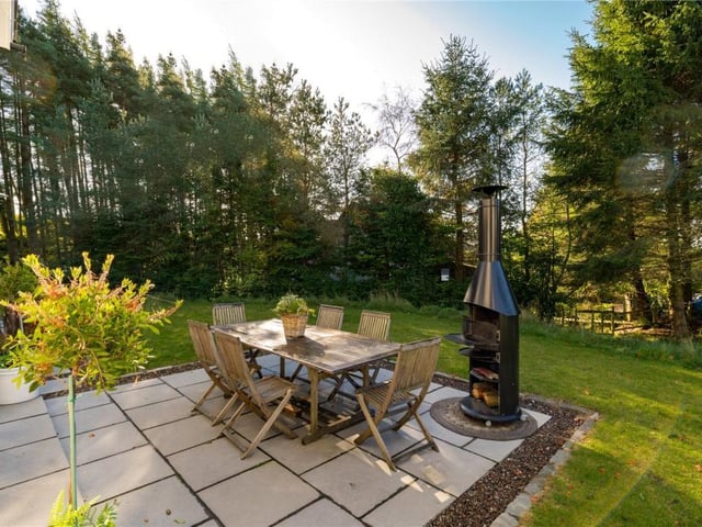 Outdoor entertaining area, paved with flagstones and accessed from the kitchen.