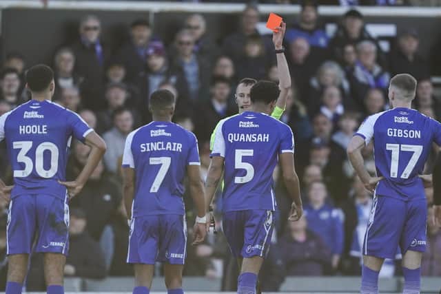 Referee James Bell shows Bristol Rovers defender Jarell Quansah a red card following an altercation with Pompey midfielder Joe Morrell during the Blues' trip to the Memorial Stadium last month.
