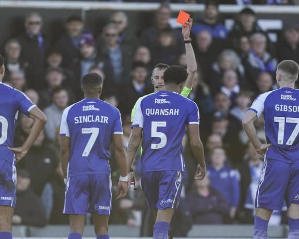 Referee James Bell shows Bristol Rovers defender Jarell Quansah a red card following an altercation with Pompey midfielder Joe Morrell during the Blues' trip to the Memorial Stadium last month.