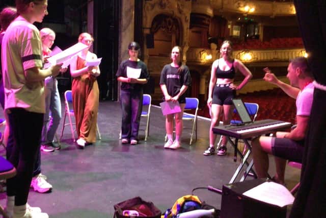 Eager school leavers on stage at the stunning King's Theatre