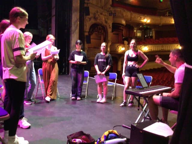 Eager school leavers on stage at the stunning King's Theatre