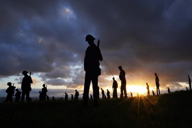A view of the Standing with Giants silhouettes which create the For Your Tomorrow installation at the British Normandy Memorial, in Ver-Sur-Mer, France, as part of the 80th anniversary of D-Day.