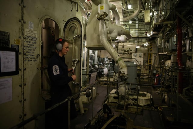 Crew member ETME Turnley seen working in the engine room onboard HMS Illustrious in May 10, 2013 Photo by Dan Kitwood/Getty Images