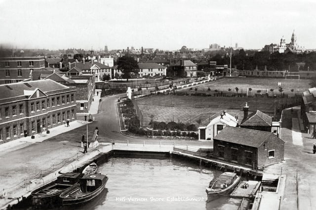 Where the 'Lipstick Tower' now stands.It is located roughly where the tree is standing centre photo. The photo was taken I believe, from the crane that loaded torpedoes into submarines in HMS Vernon.To the left is the present Customs House pub. The main gate is just out of sight to the right.