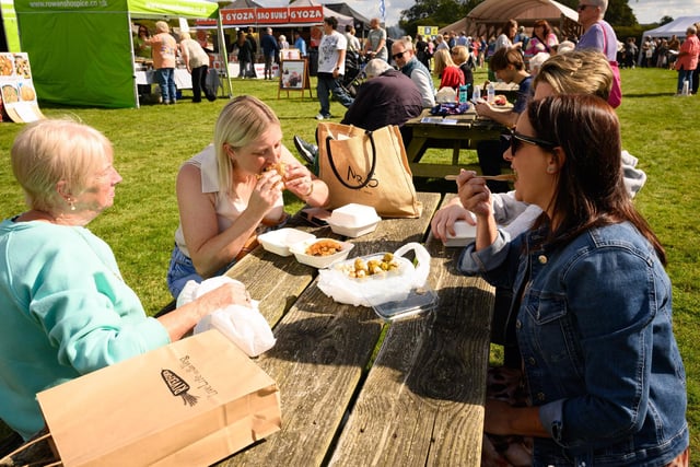 Pictured is: The Evans family enjoying the atmosphere and food at the South Downs Food Festival Picture: Keith Woodland (140921-52)