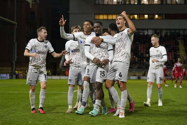 Pompey's players celebrate Christian Saydee's first-half goal at Leyton Orient in the Bristol Street Motors Trophy. Picture: Jason Brown/ProSportsImages