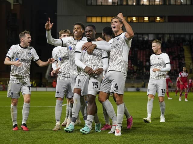 Pompey's players celebrate Christian Saydee's first-half goal at Leyton Orient in the Bristol Street Motors Trophy. Picture: Jason Brown/ProSportsImages