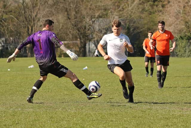 Reece Tuppen (white) netted four goals in Seagull's 8-3 cup win against Snowgoose.