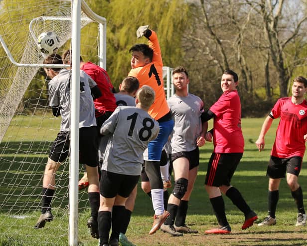AFC Prospect Farm Rangers (red/black) score against Milton Park Rangers. Picture: Kevin Shipp