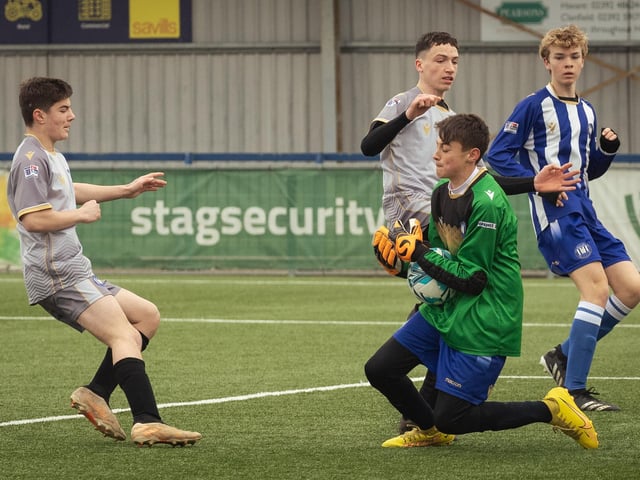 Action from the U15 Campbell McFaull Invitation Cup final between Hayling St Andrews Blue and Hayling St Andrew White. Picture: Keith Woodland (260221-356)