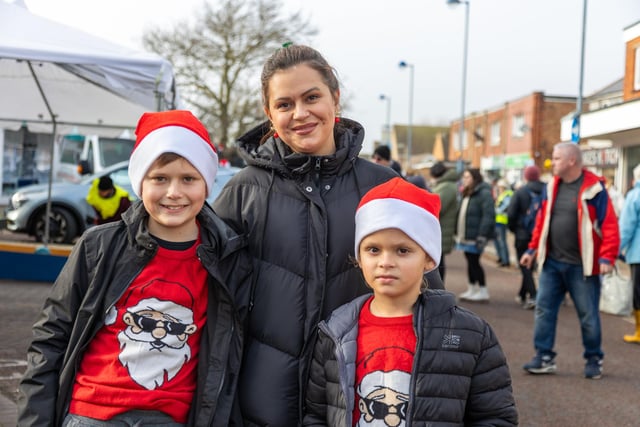 Locals braved the cold to celebrate the start of the Christmas festivites with a street party on Hayling Island on Saturday afternoon.

Pictured - Youngsters Ivan Zelenskyi, 12, his brother Nikita, 8 and mum Iryna Zelenska.

Photos by Alex Shute
