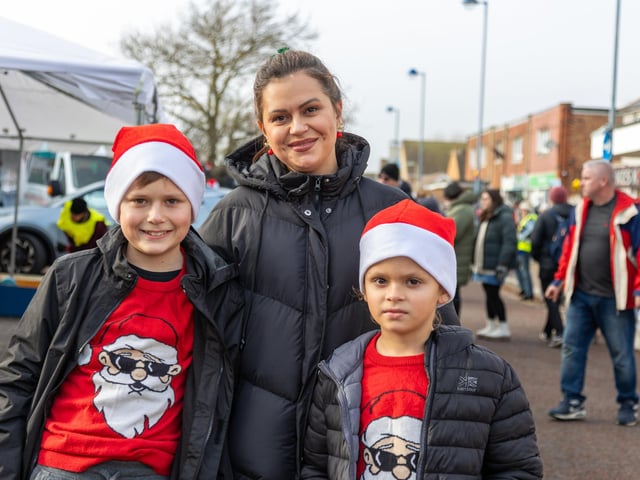 Locals braved the cold to celebrate the start of the Christmas festivites with a street party on Hayling Island on Saturday afternoon.

Pictured - Youngsters Ivan Zelenskyi, 12, his brother Nikita, 8 and mum Iryna Zelenska.

Photos by Alex Shute
