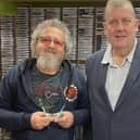 Tony Smith, left, receives his Community Media Champion Award. Picture by Angel Radio