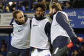 From left: Marcus Harness, Ellis Harrison and Brett Pitman warm up during Friday night's 3-0 win against Rochdale.  Picture: Robin Jones/Getty Images