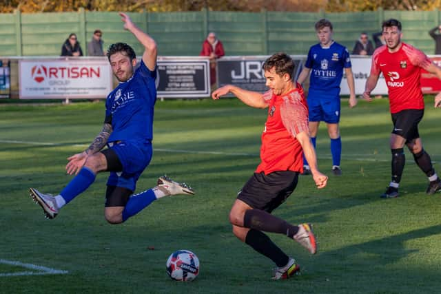 Fareham (red) v Baffins Milton Rovers. Picture: Mike Cooter