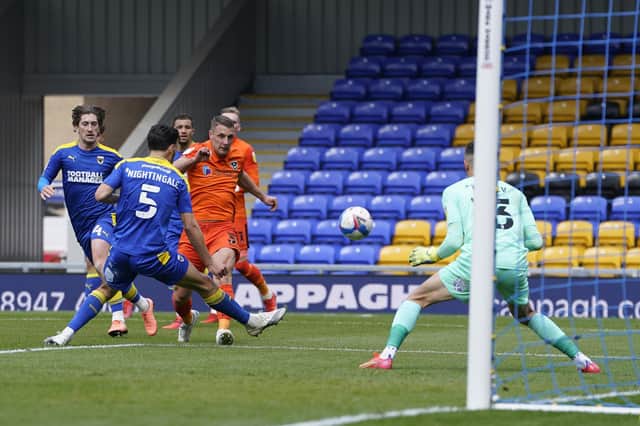 Lee Brown scores his second goal at AFC Wimbledon today