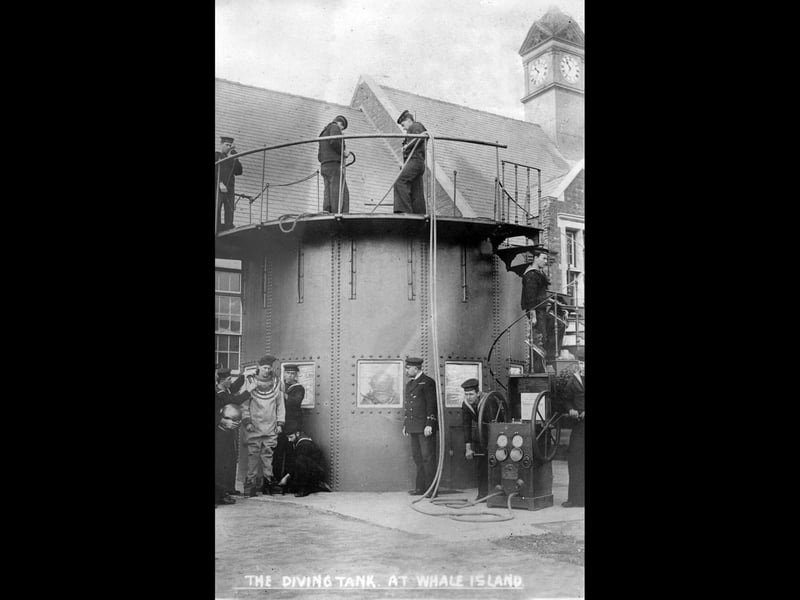 Royal navy divers training in the tank which was then at Whale Island, Portsmouth, about 1907.
