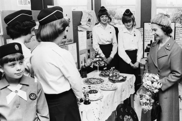 Queen Elizabeth enjoying a cookery display presented by Rangers at Trafalgar Place Community Centre, Fratton, Portsmouth July 1980.
Picture: The News Portsmouth 2248-13