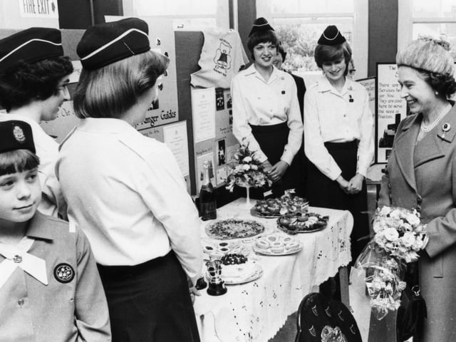 Queen Elizabeth enjoying a cookery display presented by Rangers at Trafalgar Place Community Centre, Fratton, Portsmouth July 1980.
Picture: The News Portsmouth 2248-13