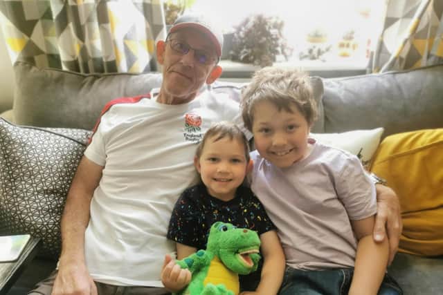 Dave Nutter, 63, of Fareham, passed away on July 18 after suffering a heart attack on the M27. Pictured is Dave alongside his grandsons, Tristin, nine, and Archie, five.