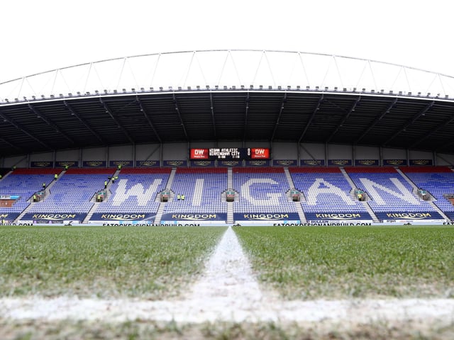 Ground name: DW Stadium.
Round-trip distance: 494 miles.