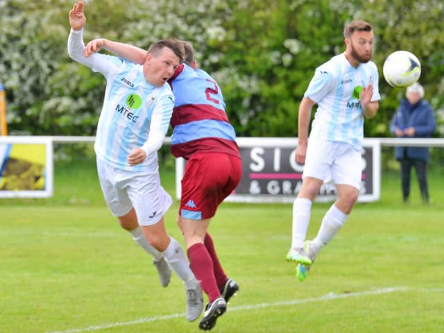 Callum Glen challenges for a header against Hamworthy. Picture: Martyn White.